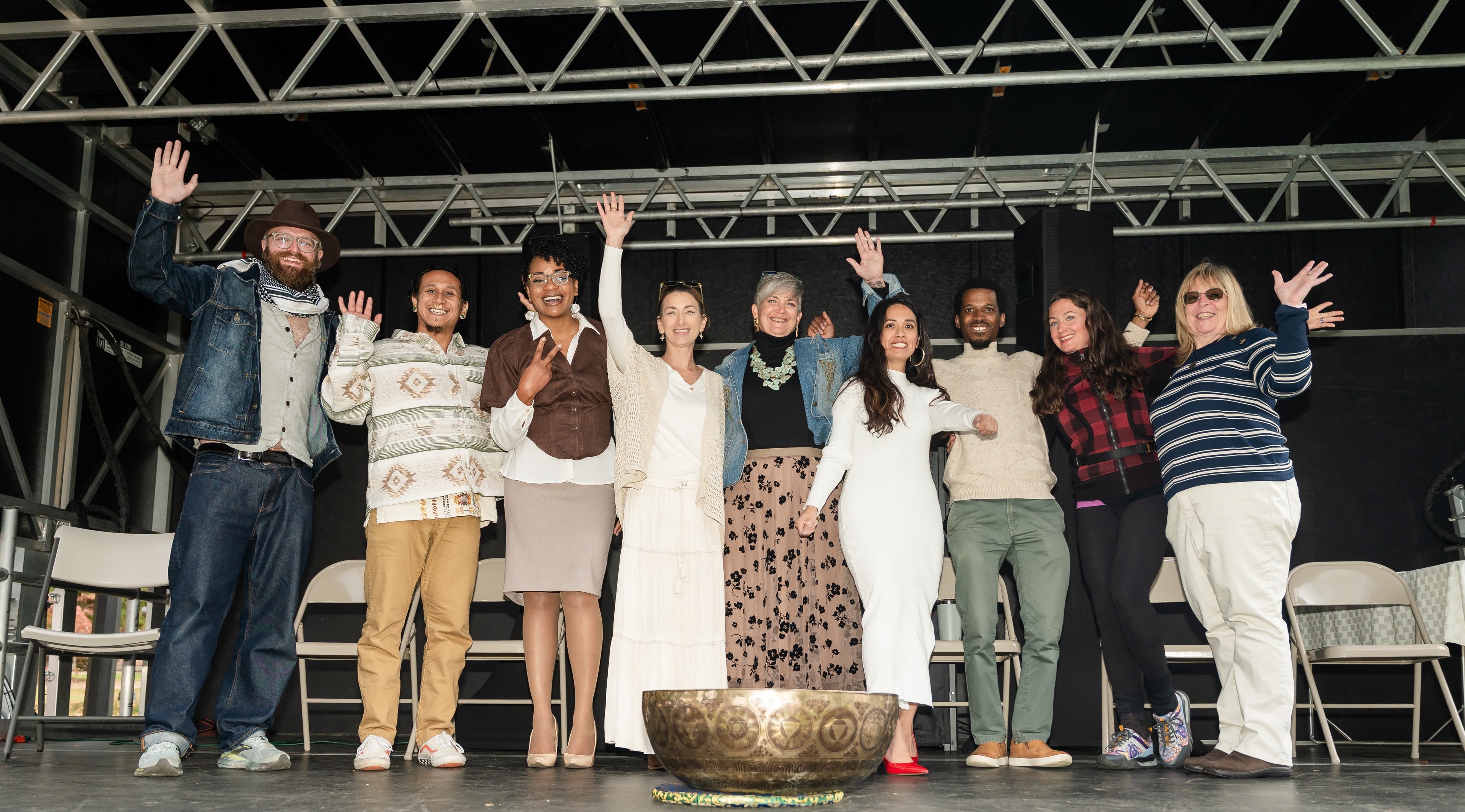 Amor Latino Counseling community partners on stage at a healing event